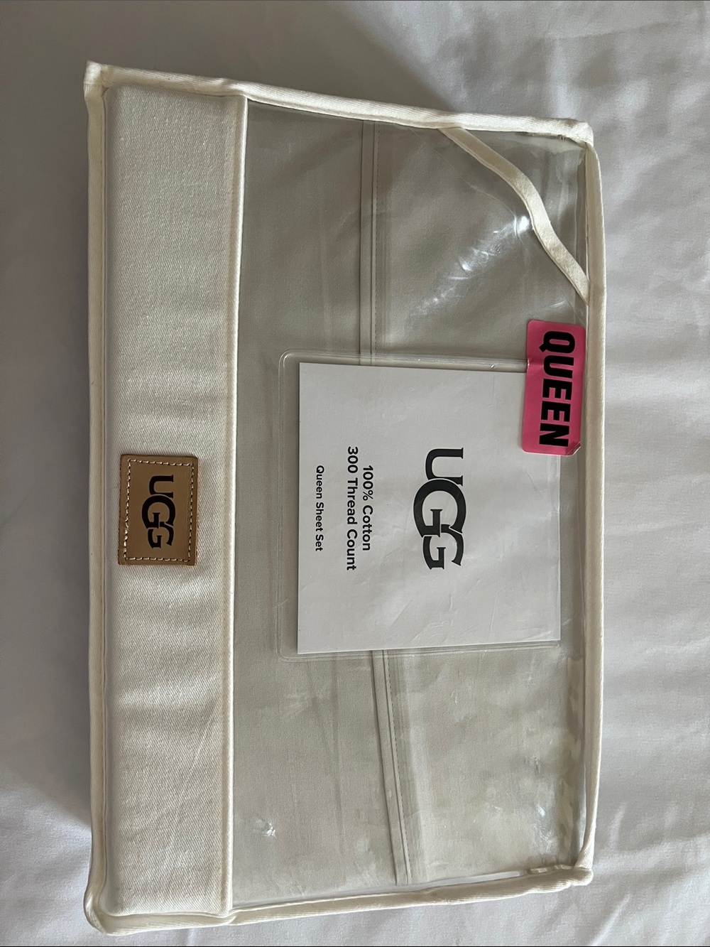 UGG Clear Travel Organizer with Cream Trim and Pink Tag